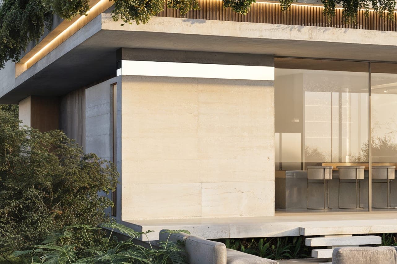 The white concrete slab edge of the lake facade cantilevering over full-height glazing, with vegetation at its border.